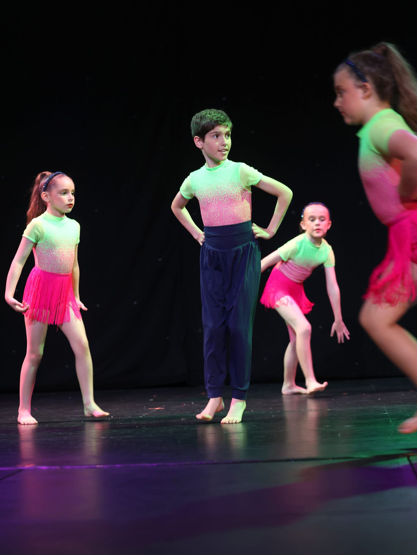 Junior jazz group in pink costume