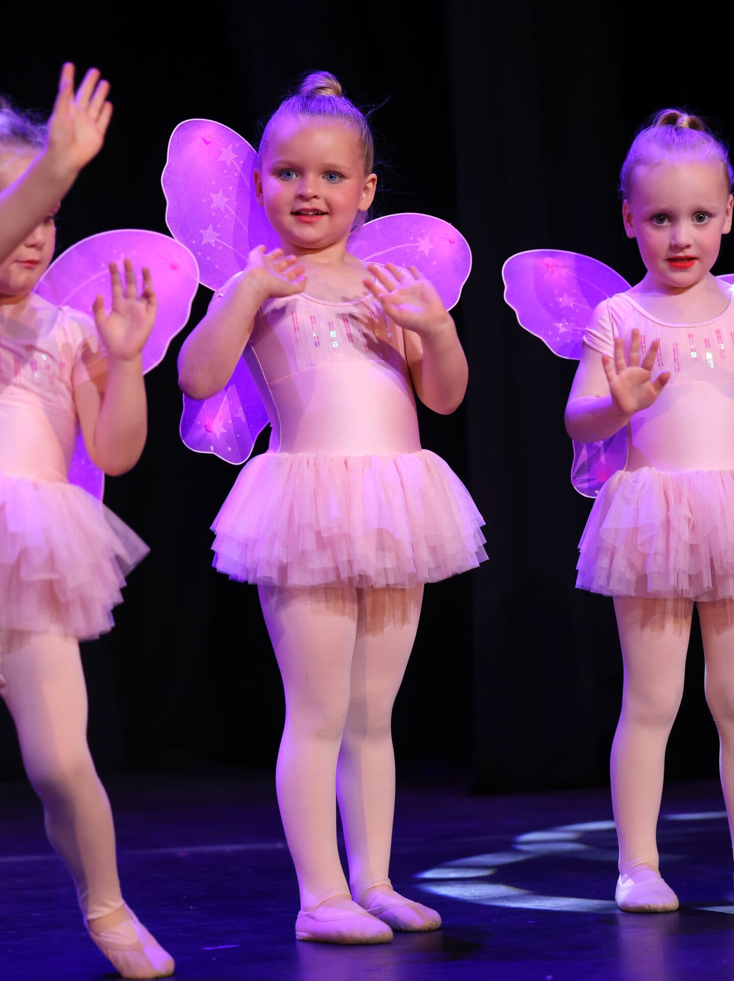 Young dancer mid-pose at JA Performing Arts