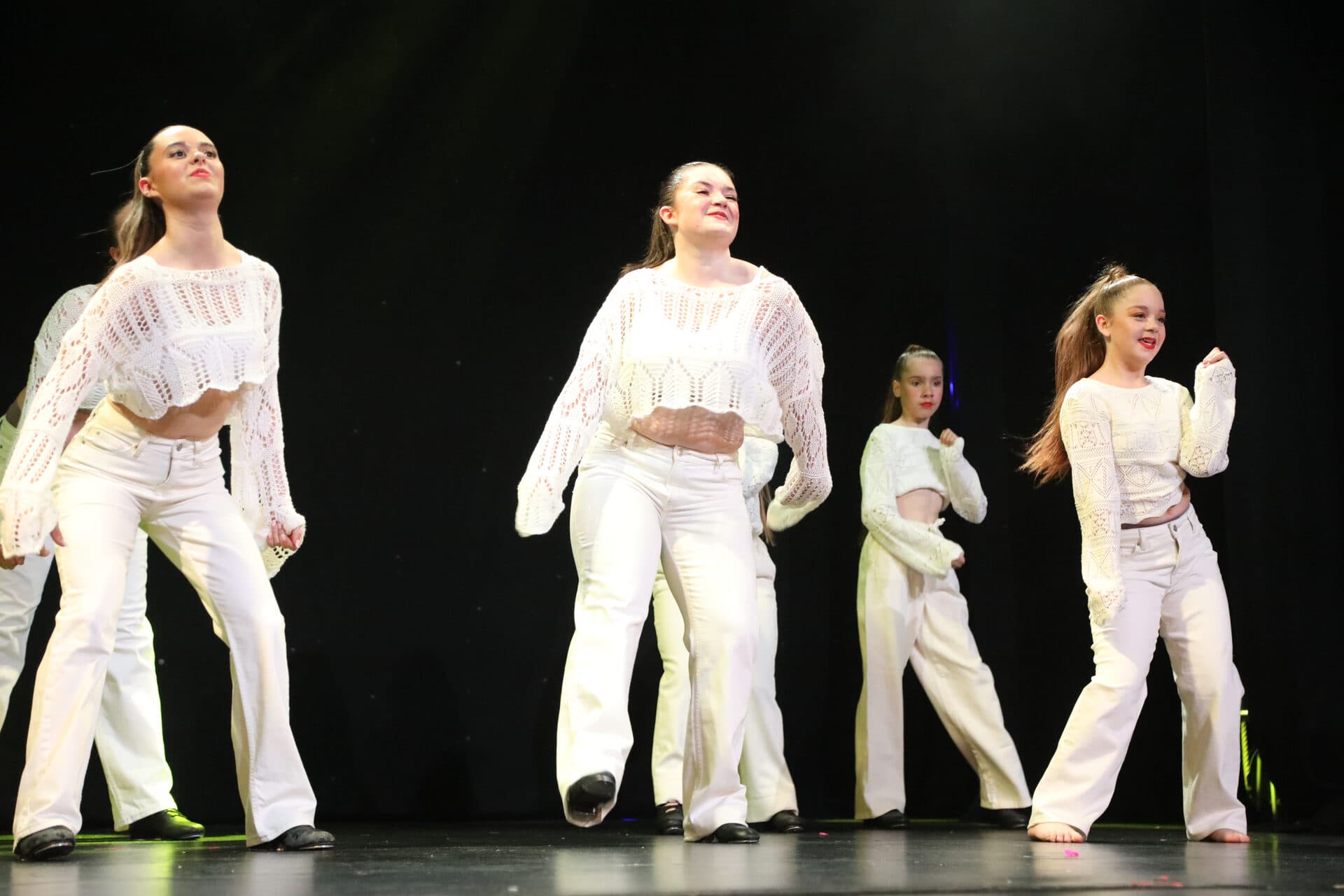 Senior dance class in cream streetwear